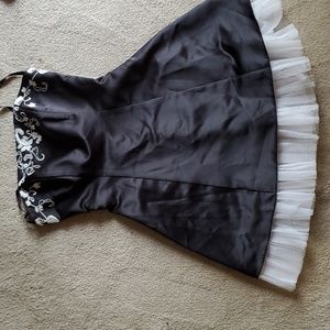 MORGAN & Co Black Strapless gown with tons of white embroidery. Ties up in back